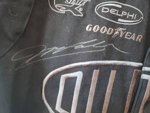 lot 103 image: SIGNED  JEFF GORDON Black Dupont Racing Jacket XL by JH Design