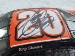 lot 99 image: Autographed TONY STEWART 124 #20 Home Depot Chevrolet Monte Carlo