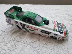 lot 112 image: JOHN FORCE 124 Die Cast #1 Castrol GTX Ford Mustang Funny Car