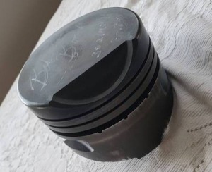 lot 23 image: Autographed BOB BODE Funny Car Piston Head