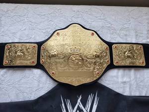 lot 20 image: WCW Heavyweight Replica Championship Title Belt & JOHN CENA Autograph