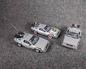 lot 13 image: Model Cars - Set of 3 DMC DeLorean Models from the Back to the Future Franchise of Movies