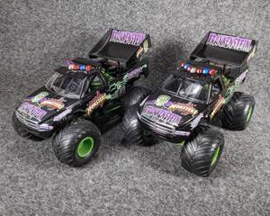 lot 22 image: Lot of 2 Frankenstein Monster Trucks