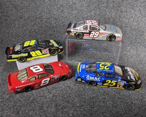 lot 23 image: Lot of 4 Die Cast NASCAR Collectible Cars