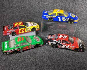 lot 24 image: Lot of 4 Die Cast NASCAR Collectible Cars