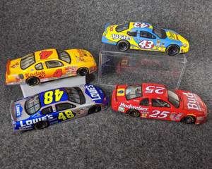 lot 26 image: Lot of 4 Die Cast NASCAR Collectible Cars