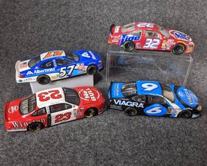 lot 27 image: Lot of 4 Die Cast NASCAR Collectible Cars