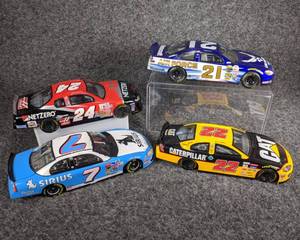 lot 29 image: Lot of 4 Die Cast NASCAR Collectible Cars