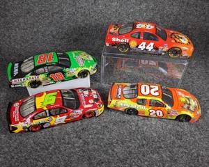 lot 31 image: Lot of 4 Die Cast NASCAR Collectible Cars