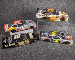 lot 32 image: Lot of 4 Die Cast NASCAR Collectible Cars
