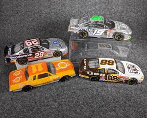 lot 33 image: Lot of 3 Die Cast and 1 Plastic NASCAR Collectible Cars