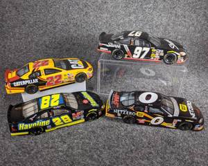 lot 34 image: Lot of 4 Die Cast NASCAR Collectible Cars