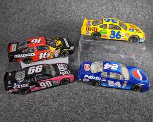 lot 35 image: Lot of 4 Die Cast NASCAR Collectible Cars