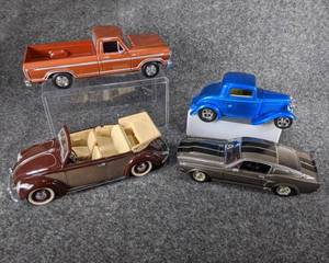 lot 50 image: Lot of 4 Die Cast Collectible Cars