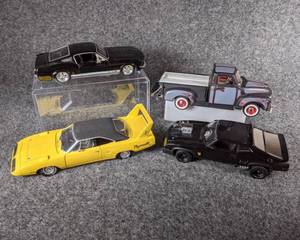 lot 51 image: Lot of 4 Die Cast Collectible Cars