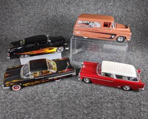lot 56 image: Lot of 4 Die Cast Collectible Cars