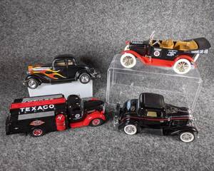 lot 57 image: Lot of 4 Die Cast Collectible Cars