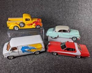 lot 61 image: Lot of 4 Die Cast Collectible Cars