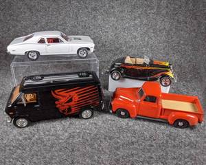 lot 62 image: Lot of 4 Die Cast Collectible Cars