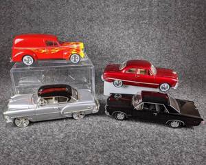 lot 63 image: Lot of 4 Die Cast Collectible Cars