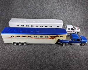 lot 73 image: Lot of 2 Die Cast Pickups with Livestock Trailers