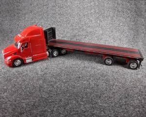 lot 74 image: Peterbilt Semi with Flatbed Trailer