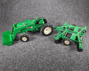 lot 90 image: Green Tractor and Implement