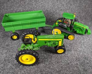 lot 91 image: Lot of 2 Die Cast John Deere Tractors