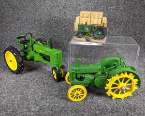 lot 92 image: Lot of 2 John Deere Collectibles and a Green Tractor Salt & Pepper Shaker Set