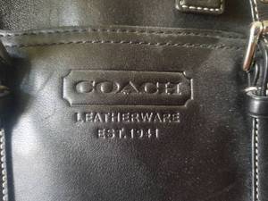 lot 38 image: Designer Black Leather Coach Purse