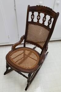 lot 96 image: Antique Eastlake Cane Seat Rocking Chair
