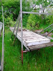 lot 4 image: Steel boat lift over 5 feet wide.