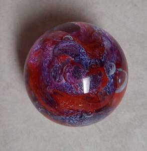 lot 22 image: Purple And Red Swirl Paperweight