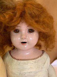 Two antique dolls.