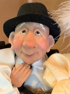 Adorable Elderly Couple Doll Set on Bench