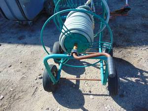 lot 14 image: Hose Reel With Hose