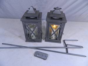 lot 56 image: Pair of Luminara Flameless Candles with Lanterns