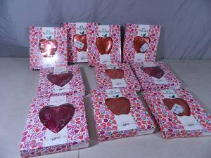 lot 103 image: 10 New Solid Milk Chocolate Dove Hearts