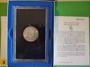 lot 2 image: 1884-CC GSA Uncirculated Morgan Dollar with Original Box & Cert. of Auth.