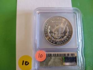 lot 10 image: 1884-CC Morgan Dollar ICG MS 62