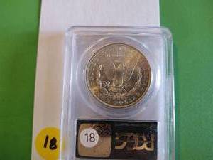 lot 18 image: 1899-O Morgan Dollar PCGS MS 64