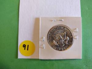 lot 91 image: 1964 BU 90% Silver Kennedy Half Dollar