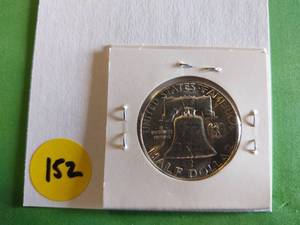 lot 152 image: 1957 P Franklin Half Dollar - MS Nicely Toned