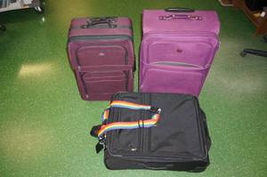 lot 107 image: Large Luggage pieces