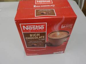 lot 14 image: 1 Box of 50 - .71 oz. packets Nestl...
