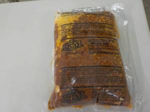lot 105 image: Large Bag Frozen Taco Sauce...