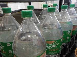lot 106 image: 8 - 2 liter bottles Spite Ginger...