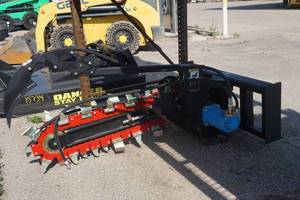 lot 13 image: Brand New Universal Mount Bobcat Skid Loader Skid Steer Trencher Attachment