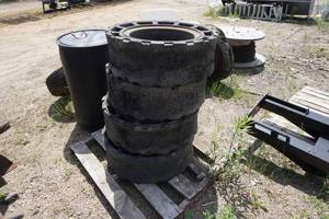 lot 48 image: 4 - EZ Load Skid Loader Skid Steer Solid Scrap Demolition Tires