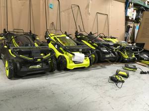 Pallet with assorted Ryobi Lawnmowers Customer Resturns some are missing parts